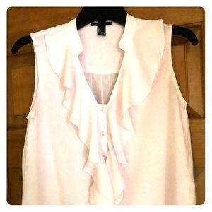 Light pink sleeveless button up blouse